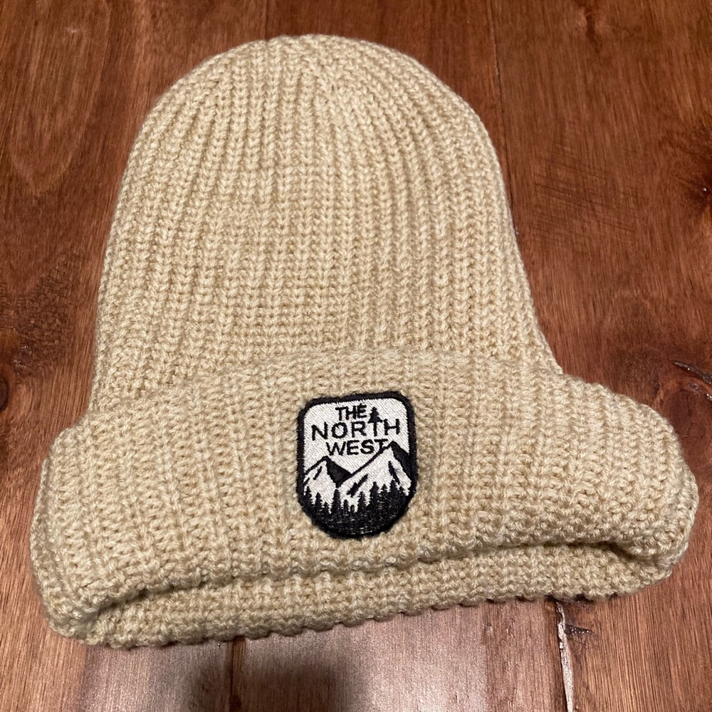 The Northwest Cream knit beanie with patch acrylic and polyester one size